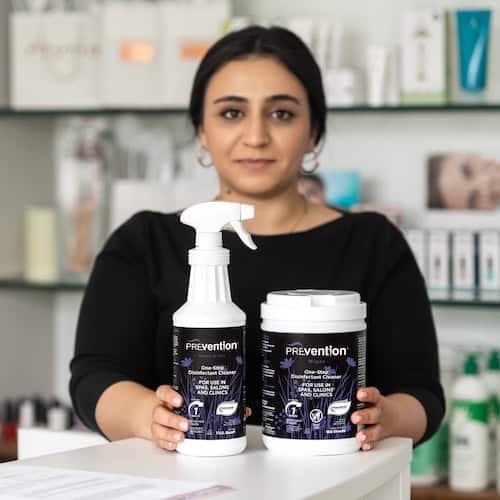 Beauty professional with Prevention Disinfectants